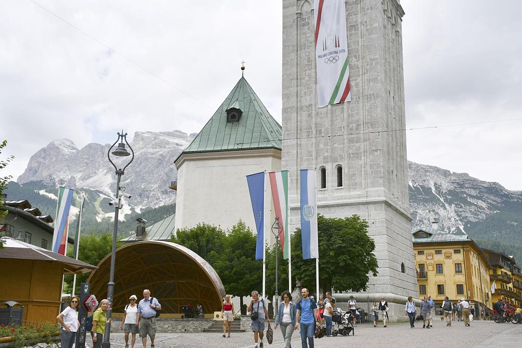 A giant banner of Milano Cortina 2026 is shown at a square in Cortina d'Ampezzo, Italy, July 2, 2019. /CFP