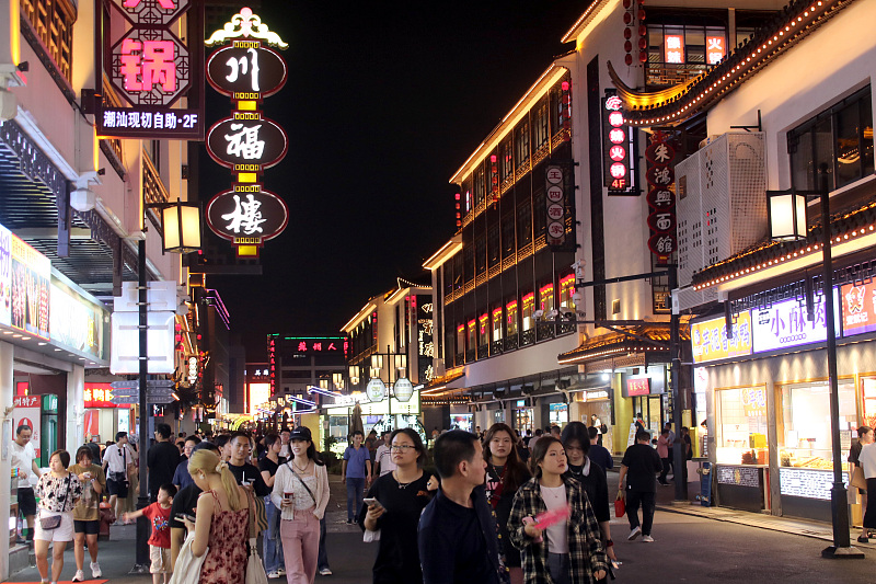 Tourists went shopping in Guanqian Street in Suzhou, September 7, 2023. /CFP
