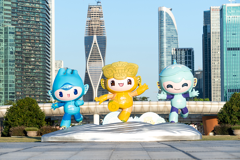 The three mascots of the 19th Asian Games appear in the Xiaoshan District of Hangzhou City, Zhejiang Province. /CFP