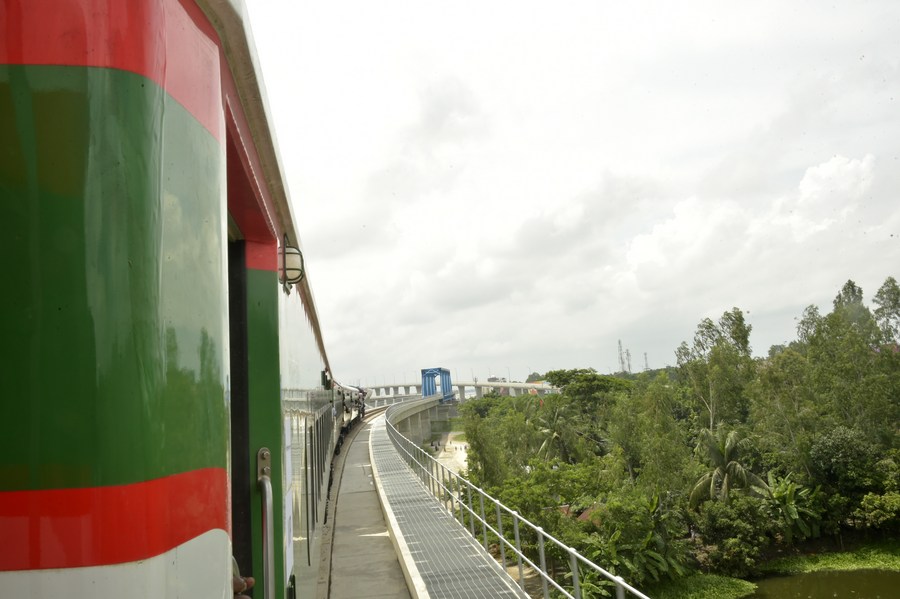 A train is pictured during a trial run along the newly-constructed mega Belt and Road Initiative (BRI) rail line that crosses the China-built Padma Bridge in Dhaka, Bangladesh, September 7, 2023. /Xinhua