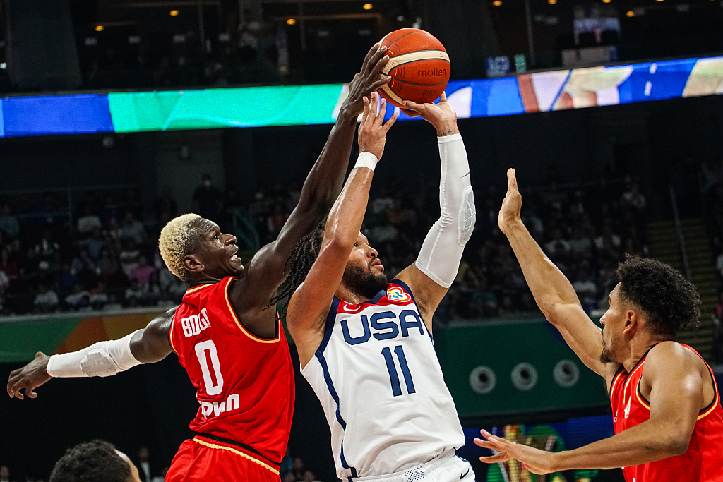 Isaac Bonga (#0) of Germany blocks a shot by Jalen Bruson (#11) of USA in the FIBA Basketball World Cup semifinals at the Mall of Asia Arena in Manila, the Philippines, September 8, 2023. /CFP