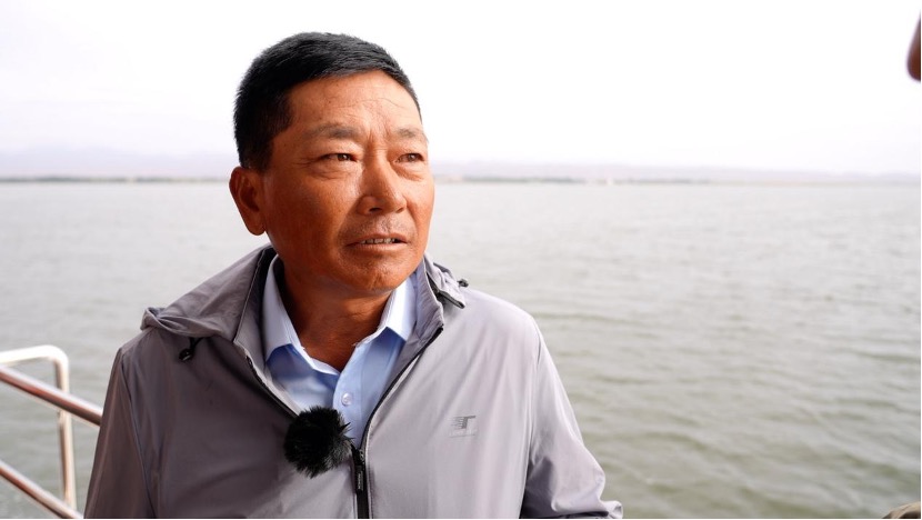 Cao Tieshan, a fisherman on Wuliangsu Lake. /CGTN