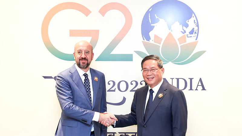 Chinese Premier Li Qiang (R) shakes hands with European Council President Charles Michel on the sidelines of the 18th G20 summit in New Delhi, India, September 10, 2023. /Xinhua