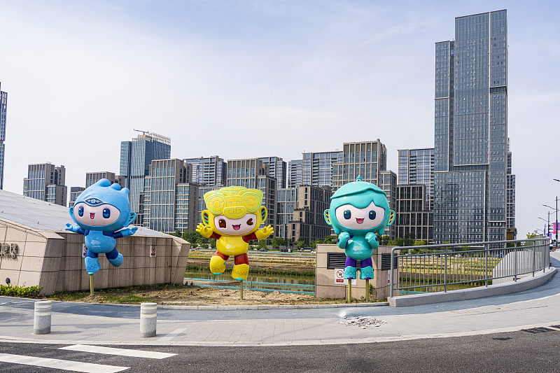 The three mascots of the 19th Asian Games appear in Hangzhou City, Zhejiang Province. /CFP