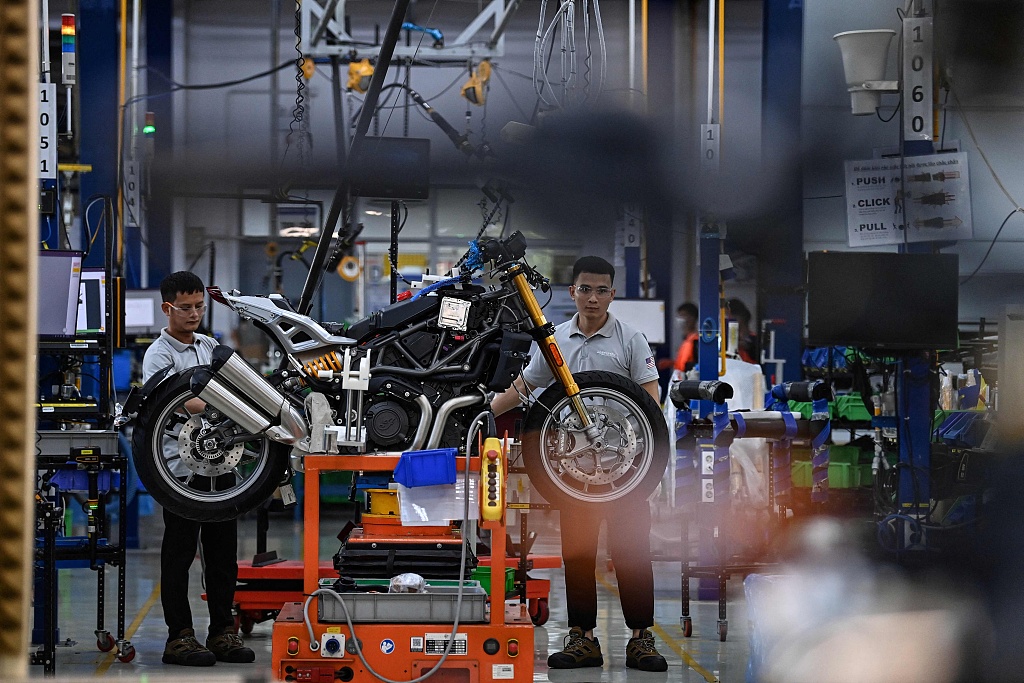 Workers assemble a motorbike at the Northstar Precision Vietnam factory in Vinh Phuc Province, Vietnam, August 30, 2023. /CFP