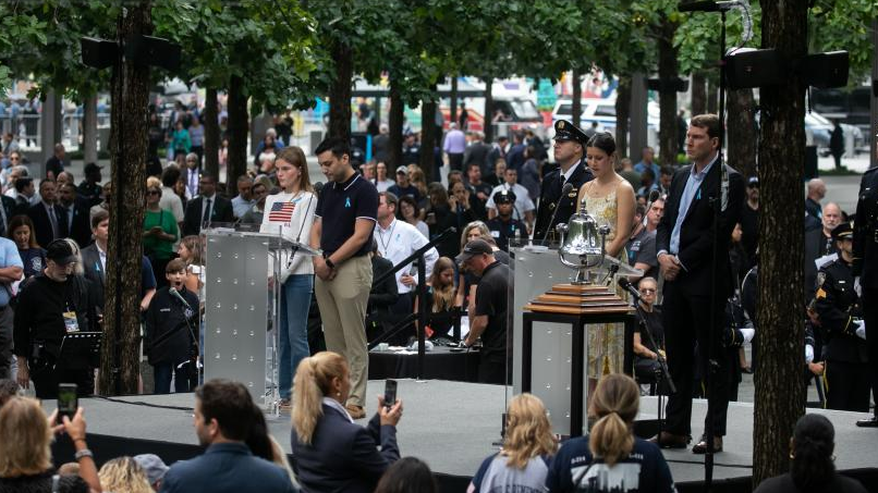 Family members read names of 9/11 victims during a commemoration ceremony of the 22nd anniversary of the 9/11 attacks in New York, the United States, September 11, 2023. /Xinhua