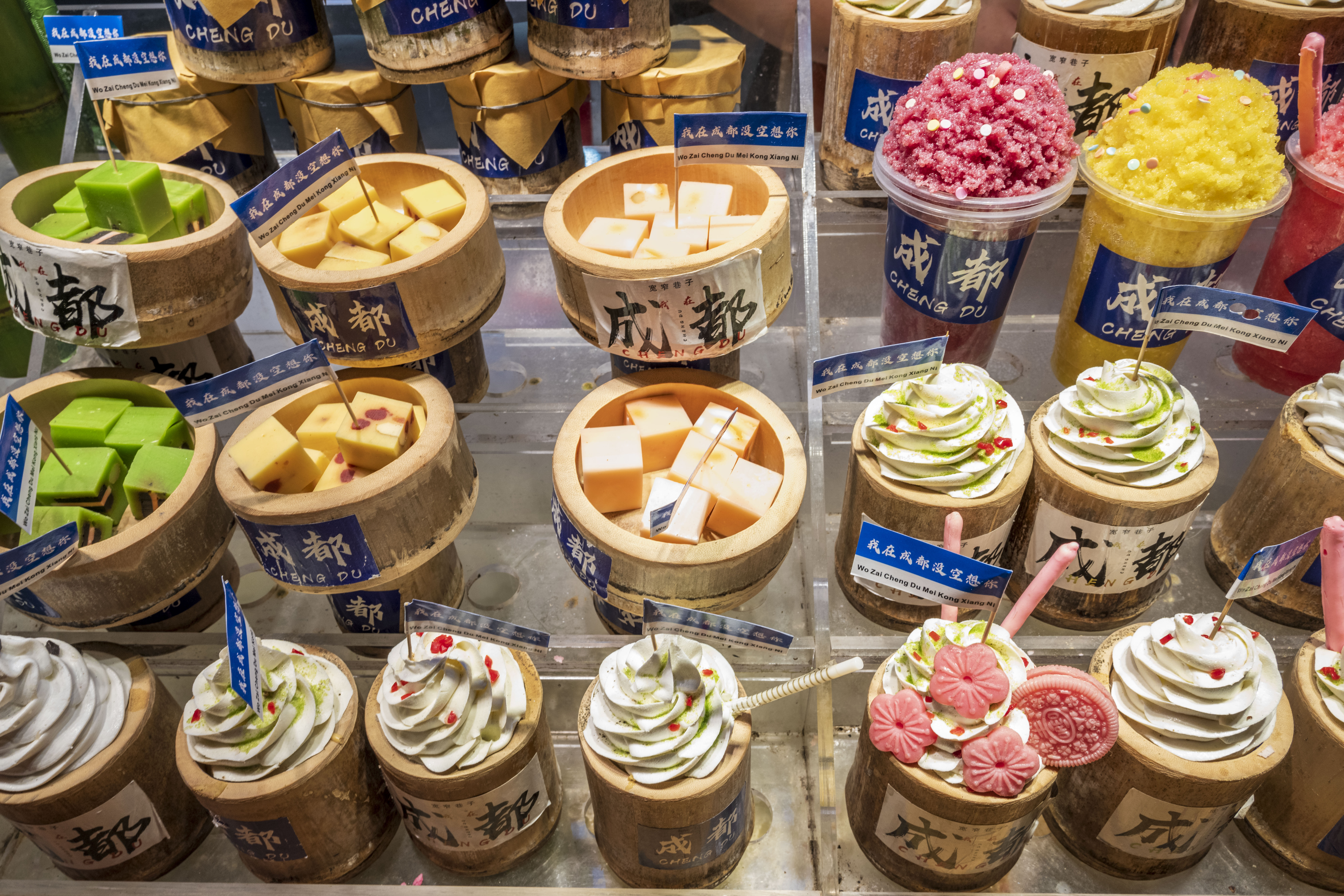 A photo shows brightly-colored ice creams on display at a shop in Chengdu, Sichuan on September 9, 2023. /IC