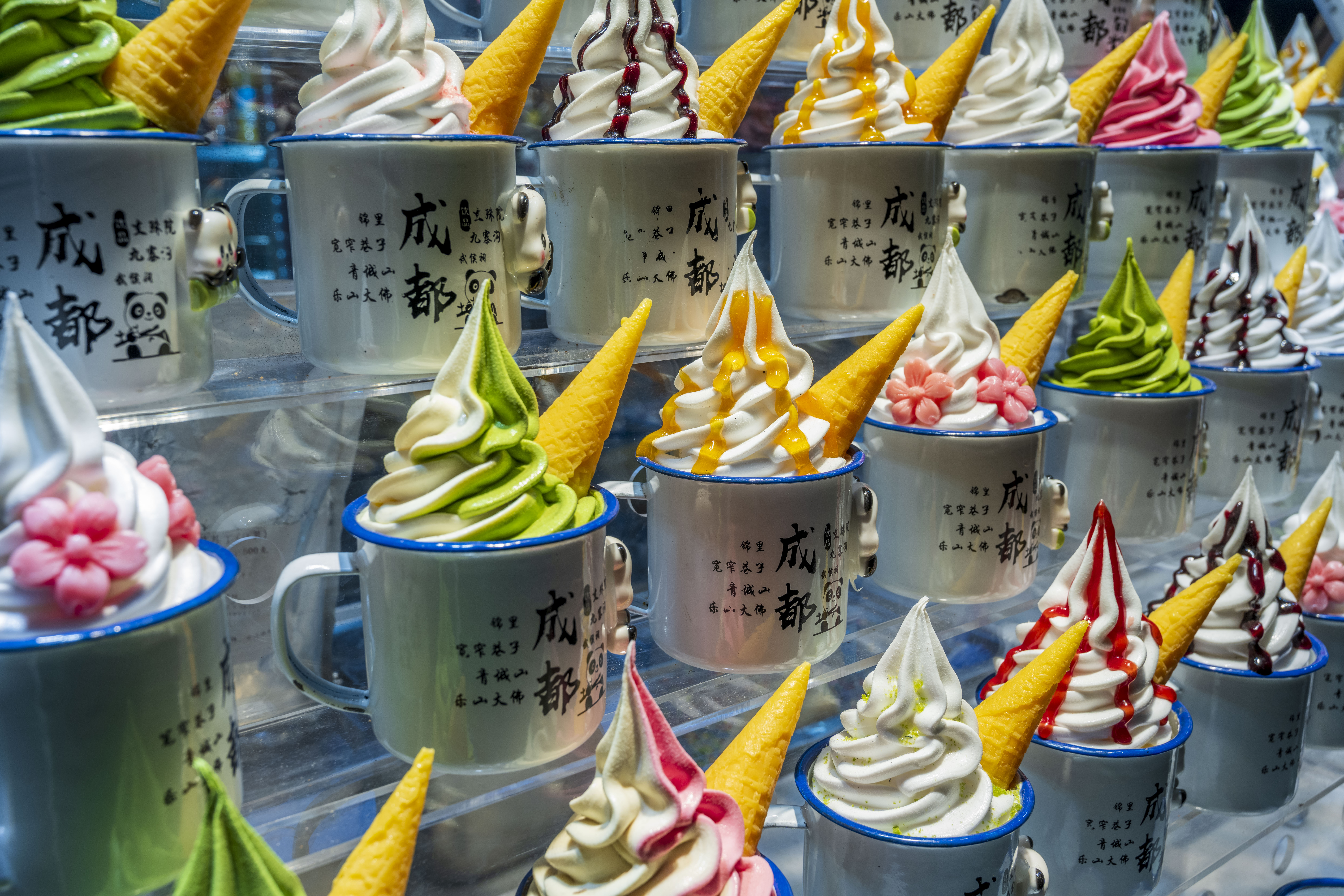 A photo shows brightly-colored ice creams on display at a shop in Chengdu, Sichuan on September 9, 2023. /IC