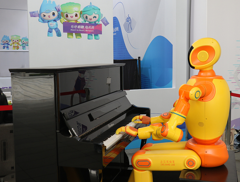 A robot plays the piano at the Asian Games Village in Hangzhou, Zhejiang Province, September 12, 2023. /CFP