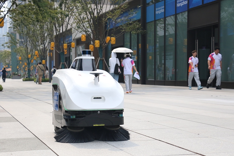 An automated street-cleaning machine is seen at the Asian Games Village in Hangzhou, Zhejiang Province, September 12, 2023. /CFP