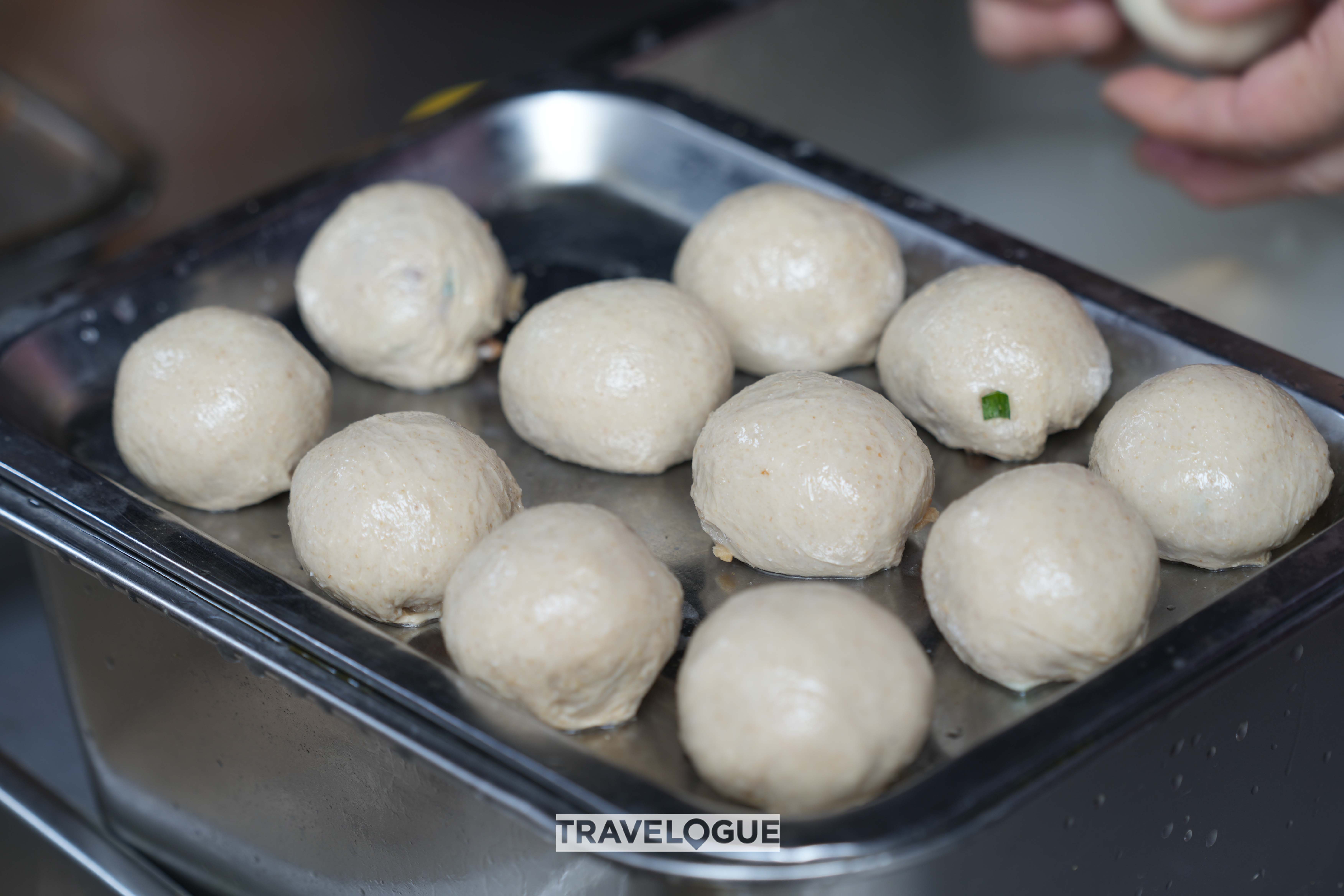 Sun Quan meatballs are seen in Longmen Ancient Town, Hangzhou, Zhejiang Province /CGTN