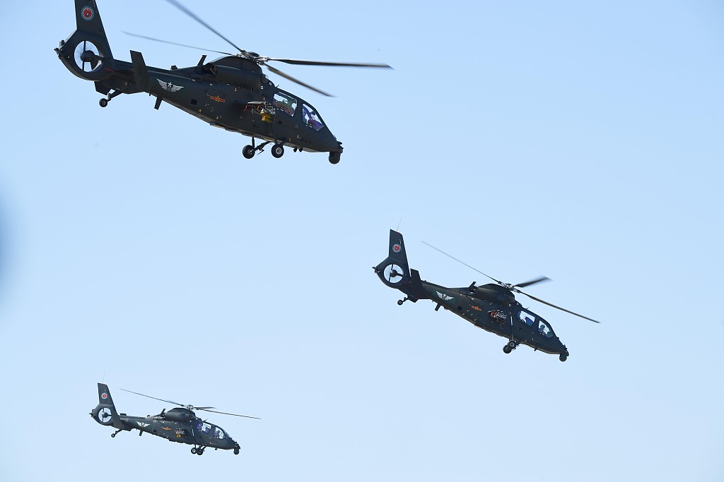 Three Z-19 helicopters perform aerobatic stunts at the sixth China Helicopter Exposition in north China's Tianjin Municipality, September 14, 2023. /CFP