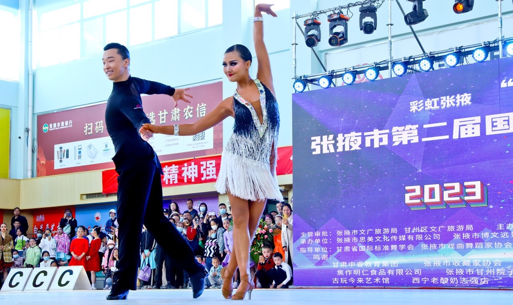 A pair performs the rumba at a competition in Zhangye, Gansu Province earlier this year. /IC