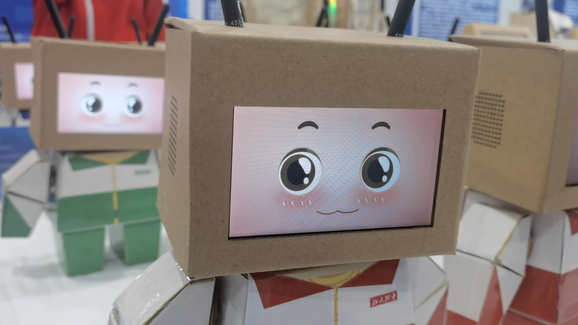 Cardboard robots created by students smile at a science popularization event in Beijing, China, September 15, 2023. /CGTN