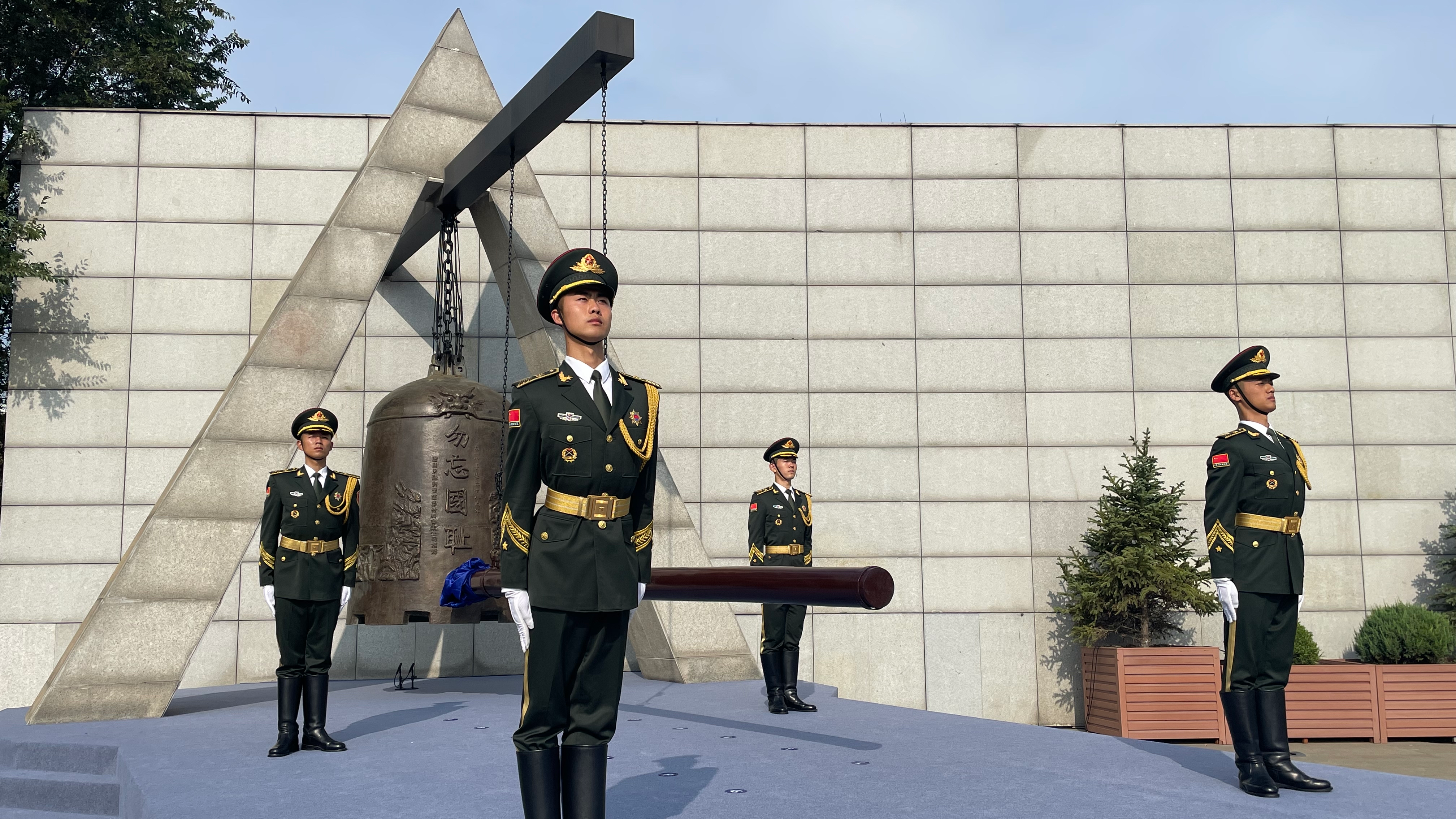 Soldiers strike the bell to mark the 92nd anniversary of the September 18 Incident in Shenyang City, northeast China's Liaoning Province, September 18, 2023. /CGTN