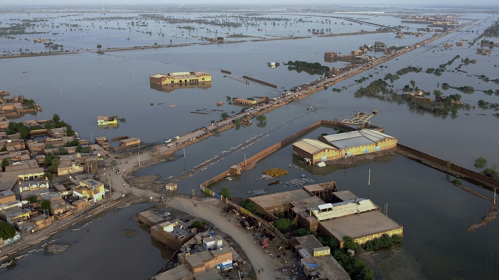 Homes are surrounded by floodwaters in Sohbat Pur city, a district of Pakistan's southwestern Baluchistan province, August 29, 2022. /CFP