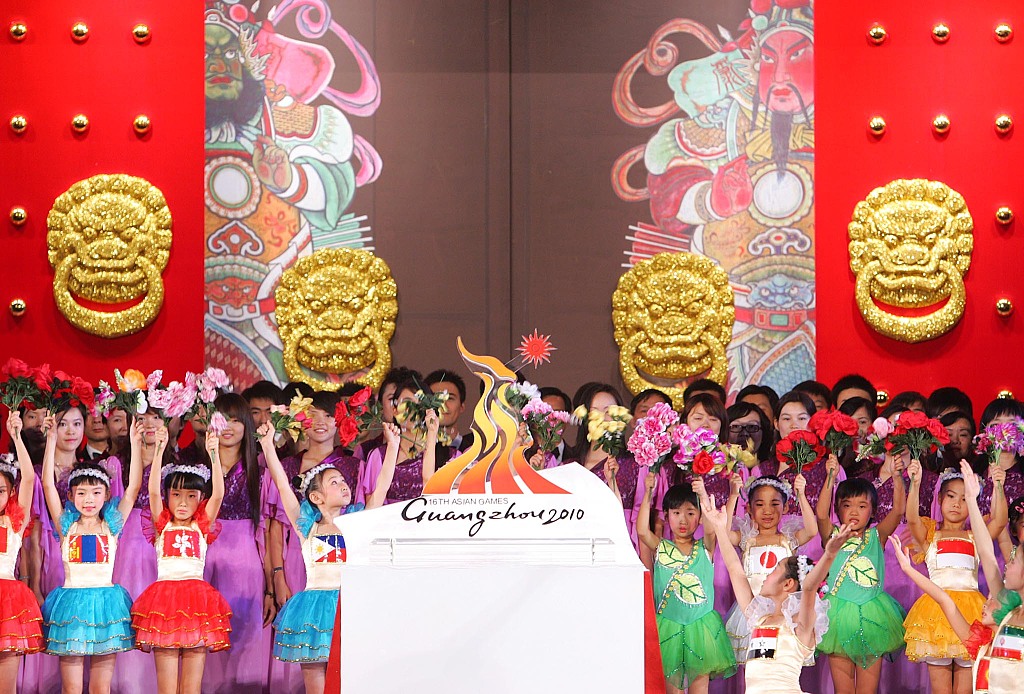 A file photo shows the emblem of the 16th Asian Games being unveiled in Guangzhou, Guangdong Province, China. /CFP
