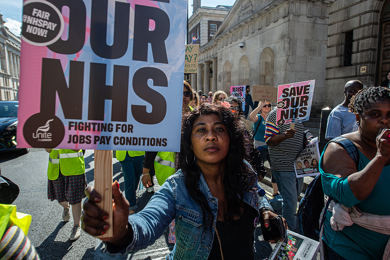 Striking National Health Service workers are seen during a march through Westminster to demand fair pay and safe staffing levels in London, England, September 14, 2023. /CFP 