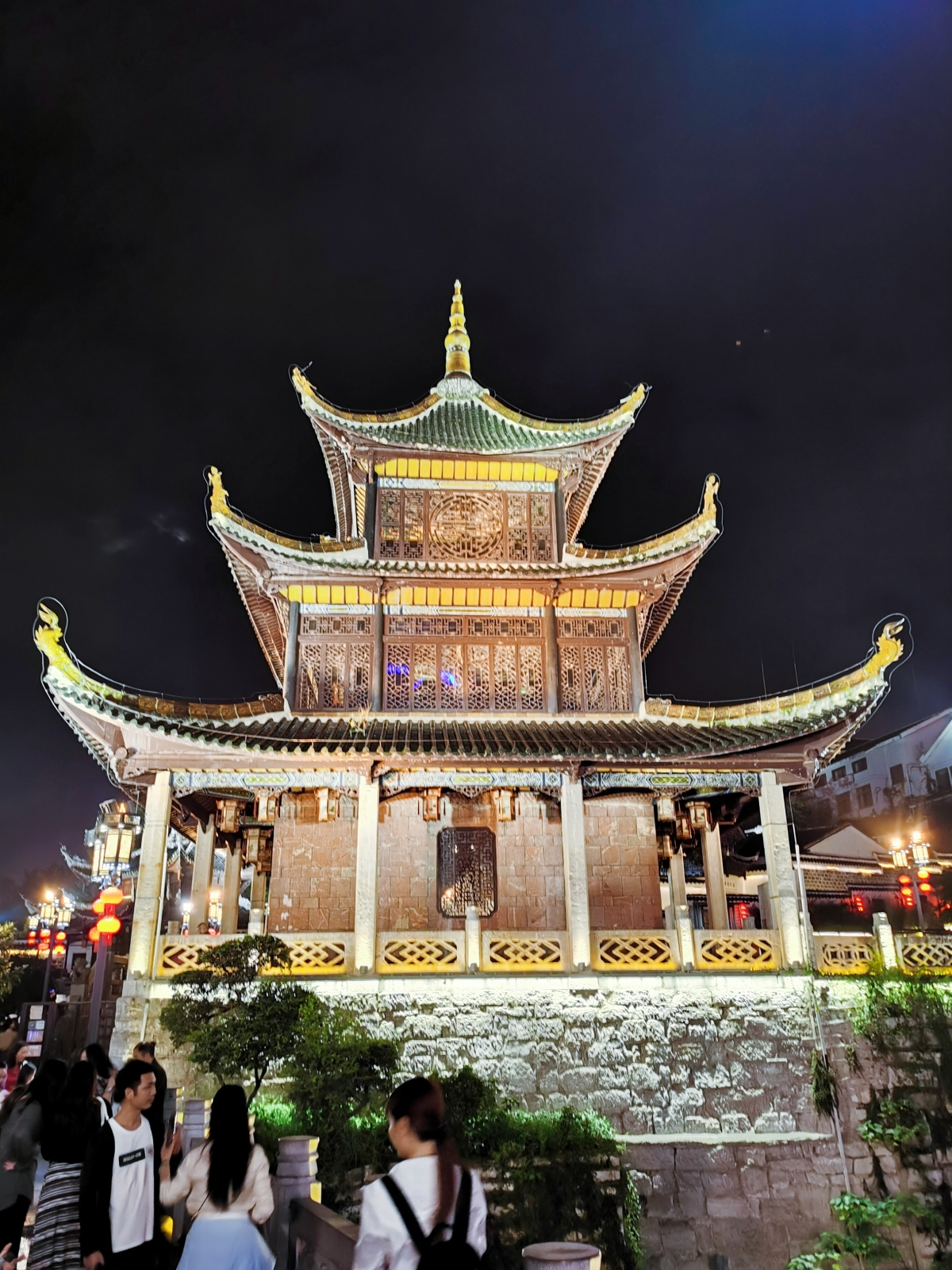 Tourists admire night views of the Jiaxiu Pavilion in Guiyang, southwest China's Guizhou Province, on August 28, 2023. /CGTN