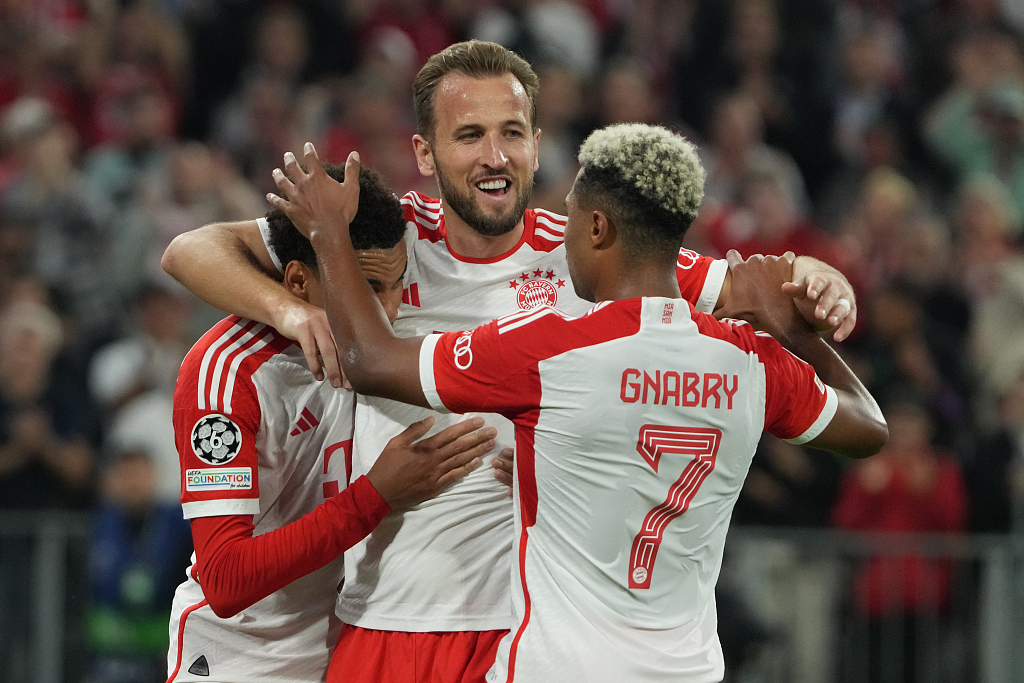 Harry Kane (C) of Bayern Munich celebrates with his teammates after scoring a goal against Manchester United during their Champions League Group A match at Allianz Arena in Munich, Germany, September 20, 2023. /CFP
