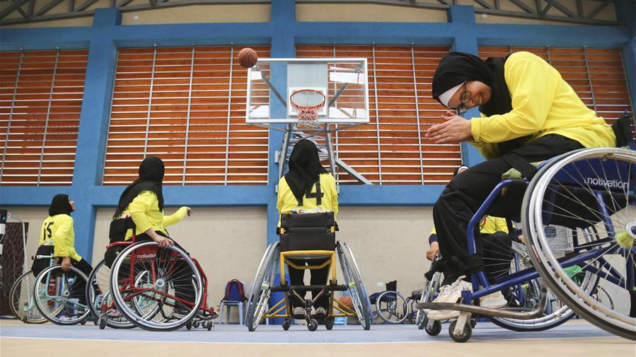 Palestinian disabled women compete during a wheelchair basketball match in Gaza City, April 16, 2019. /Xinhua