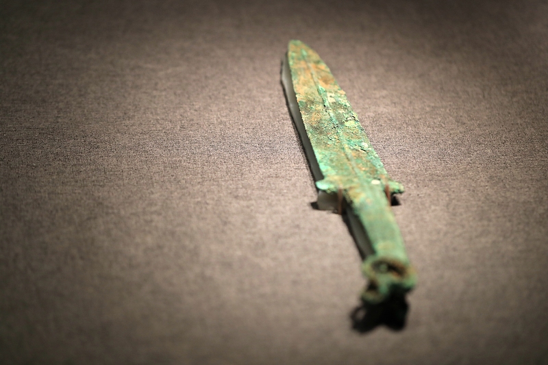 A bronze dagger is exhibited at the Chinese Archaeological Museum in Beijing on September 20, 2023. /CFP
