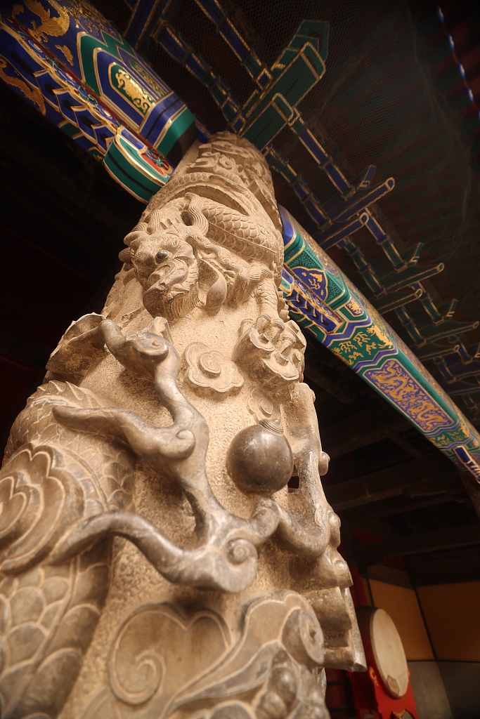 Dragon embossments are seen on a column at the Temple of Confucius in Qufu, Shandong Province. /CFP