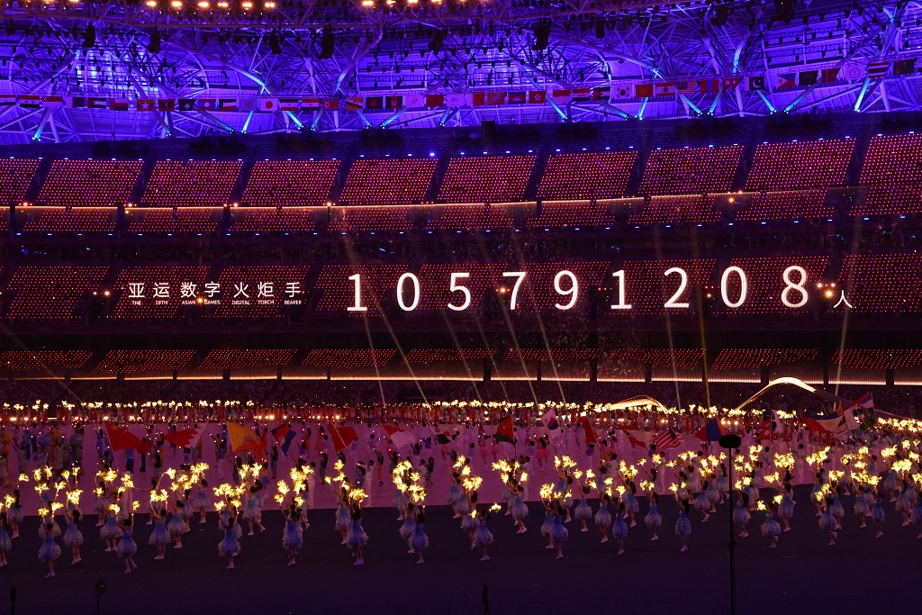 The number of digital torch bearers is shown on the big screen at the opening ceremony for the 19th Asian Games in Hangzhou, east China's Zhejiang Province, September 23. /CFP