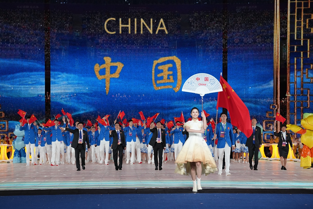 Chinese athletes attend the parade at the opening ceremony of the 19th Asian Games at the Hangzhou Olympic Sports Center Stadium in Hangzhou, east China's Zhejiang Province, September 23, 2023. /CFP