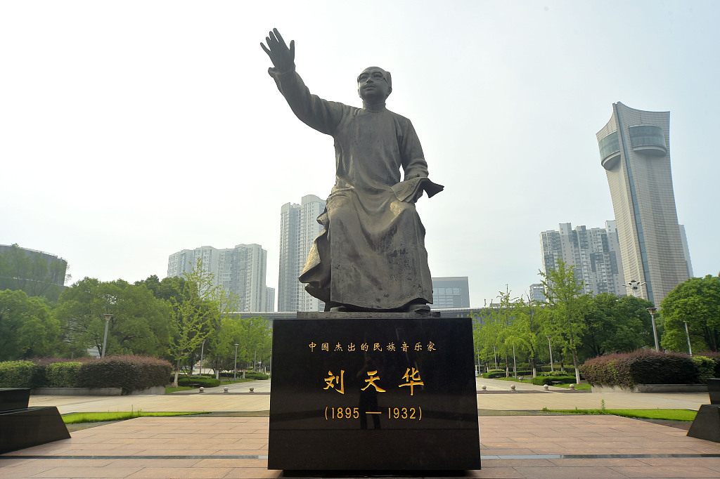 A statue of well-known Chinese music educator Liu Tianhua is photographed at a square in Wuxi, Jiangsu Province, July 3, 2023. /CFP