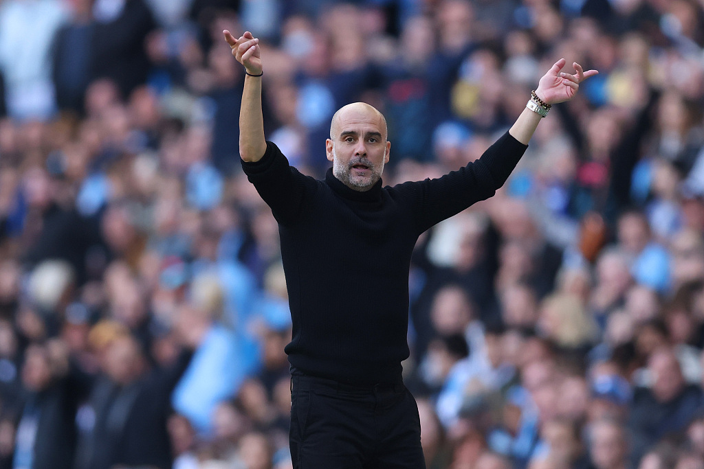 Pep Guardiola, manager of Manchester City, looks on during the Premier League game against Nottingham Forest at the City of Manchester Stadium in Manchester, England, September 23, 2023. /CFP