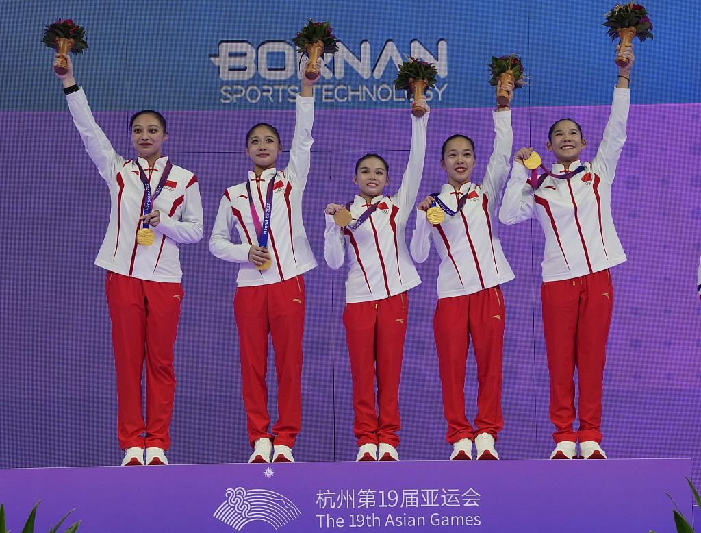 Athletes of China pose with their gold medals after winning the artistic gymnastics women's team event in the 19th Asian Games in Hangzhou, east China's Zhejiang Province, September 25, 2023. /CFP