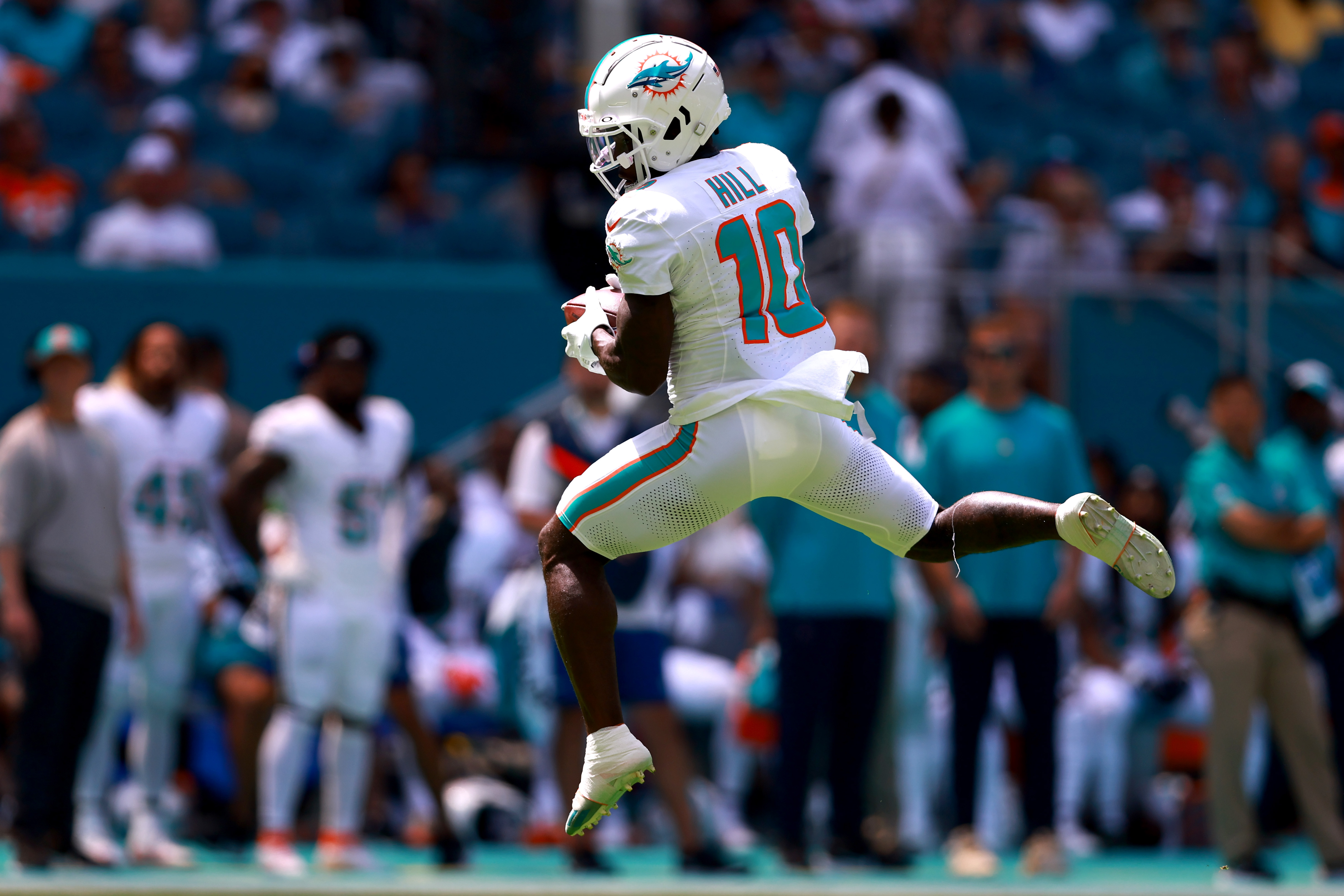 Wide receiver Tyreek Hill of the Miami Dolphins catches a pass to score a touchdown in the game against the Denver Broncos at Hard Rock Stadium in Miami Garden, Florida, September 24, 2023. /CFP