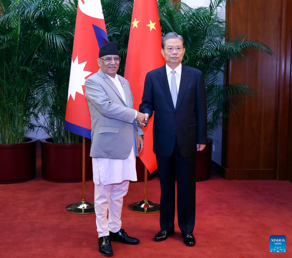 Zhao Leji (R), chairman of the National People's Congress Standing Committee, meets with Nepalese Prime Minister Pushpa Kamal Dahal Prachanda in Beijing, China, September 25, 2023. /Xinhua