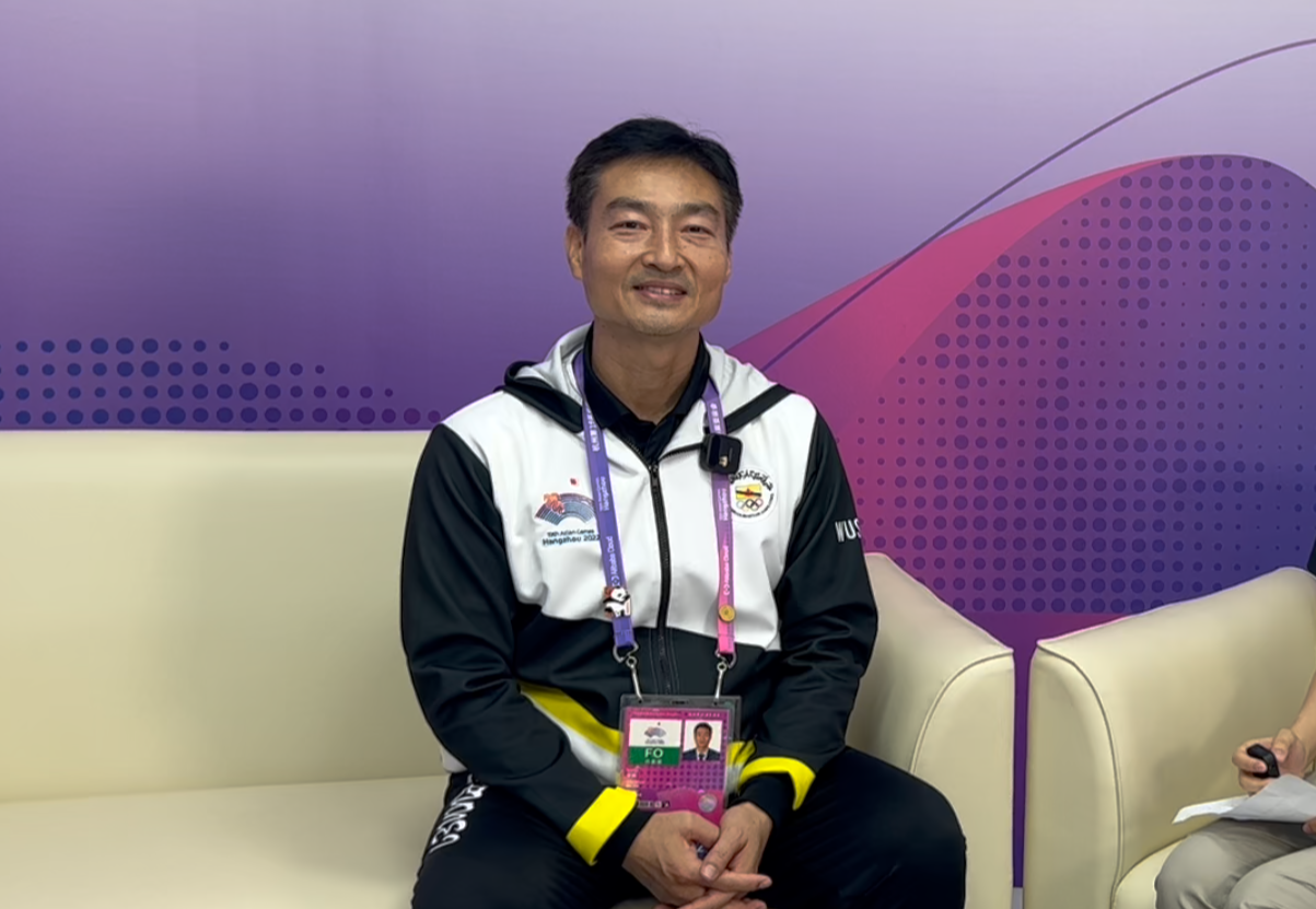 Head coach of Brunei's Wushu team Li Hui. /CMG