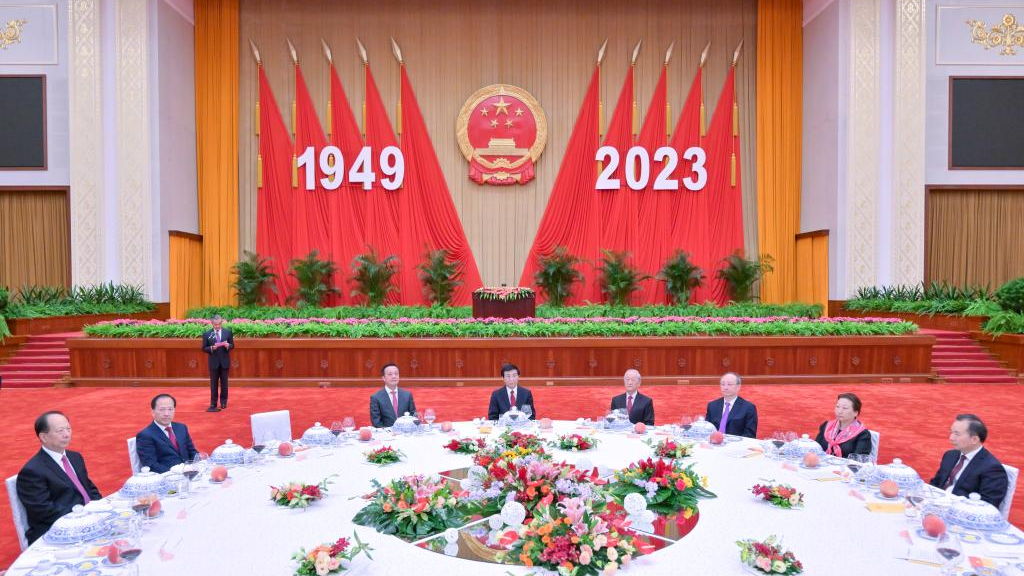 Wang Huning, a member of the Standing Committee of the Political Bureau of the Communist Party of China (CPC) Central Committee and chairman of the National Committee of the Chinese People's Political Consultative Conference (CPPCC), attends a reception held in Beijing to celebrate the upcoming 74th anniversary of the founding of the People's Republic of China at the Great Hall of the People in Beijing, capital of China, September 25, 2023. /Xinhua