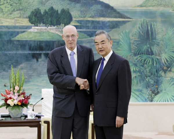 Wang Yi (R), a member of the Political Bureau of the Communist Party of China Central Committee and director of the Office of the Central Commission for Foreign Affairs, meets with former U.S. Secretary of the Treasury Henry Paulson in Beijing, China, September 26, 2023. /Chinese Foreign Ministry