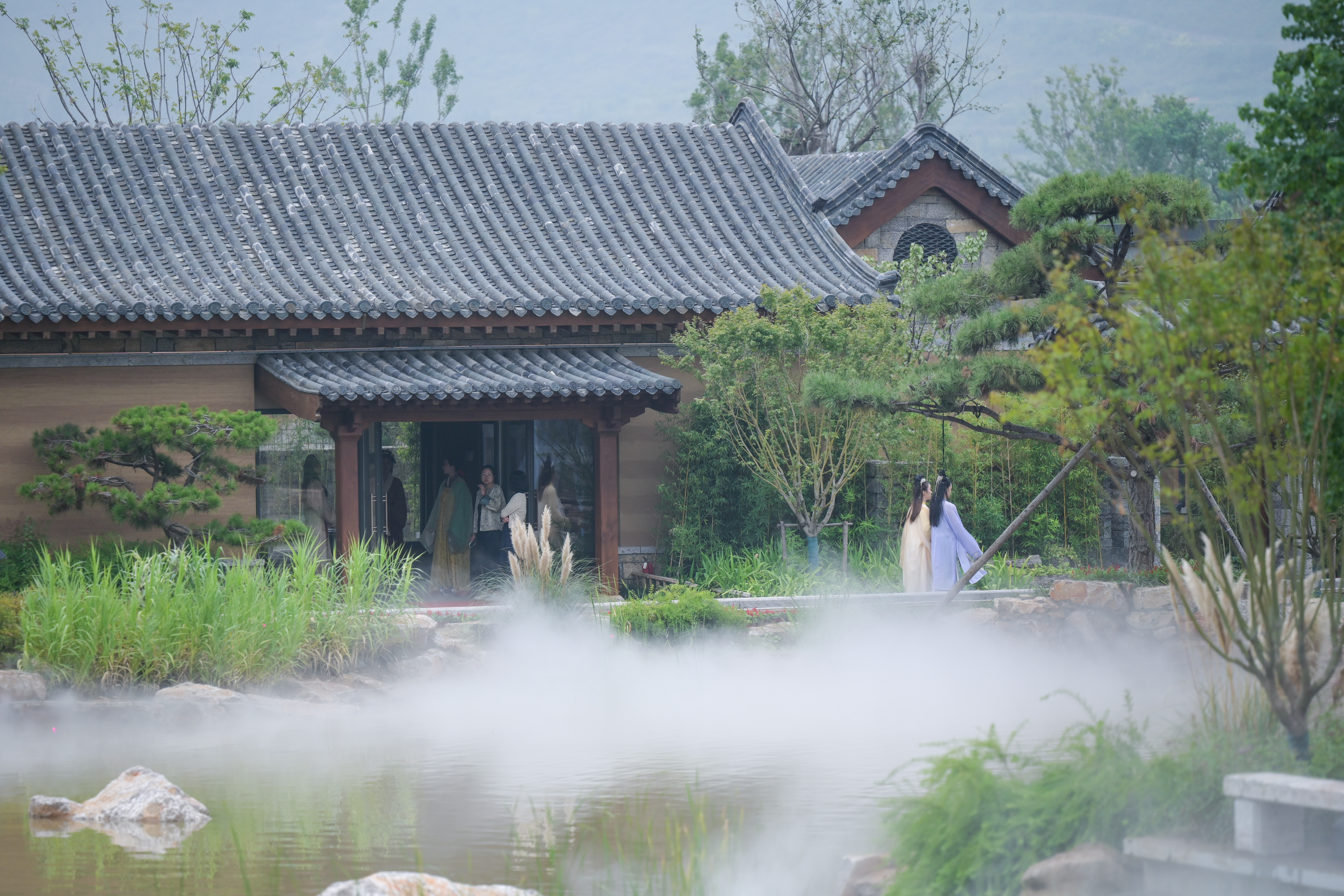 A photo shows visitors strolling through Luyuan Town on September 26, 2023 in Qufu, Shandong. /IC