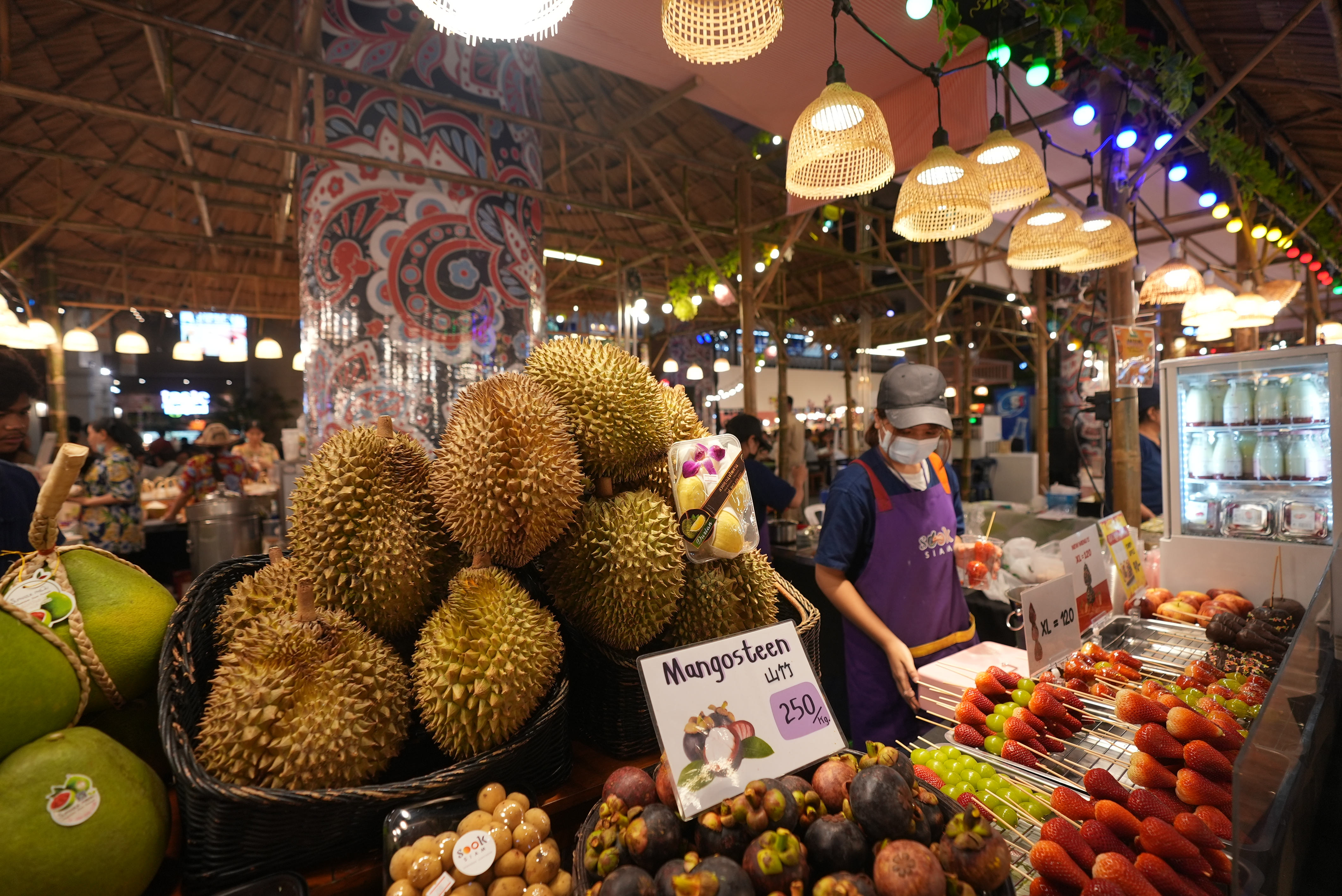 This photo taken on September 18, 2023 shows a fruit stand at a local indoor floating market in Bangkok, Thailand. /CGTN 