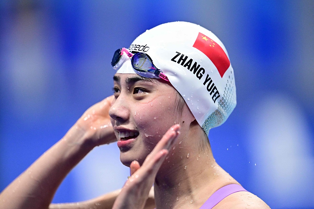 Zhang Yufei of China celebrates after winning the women's 50m freestyle final during the 19th Asian Games in Hangzhou, China, September 28, 2023. /CFP