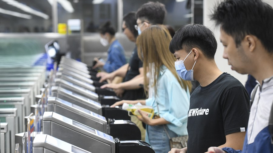 Travelers depart for Hong Kong from the Luohu Port in Shenzhen City, south China's Guangdong Province, May 3, 2023. /Xinhua