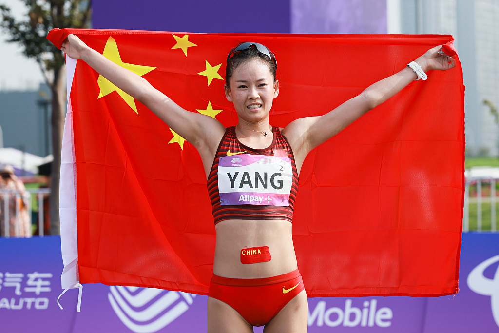 China's Yang Jiayu celebrates after winning the women's 20km race walk final in the 19th Asian Games in Hangzhou, Zhejiang Province, China, September 29, 2023. /CFP