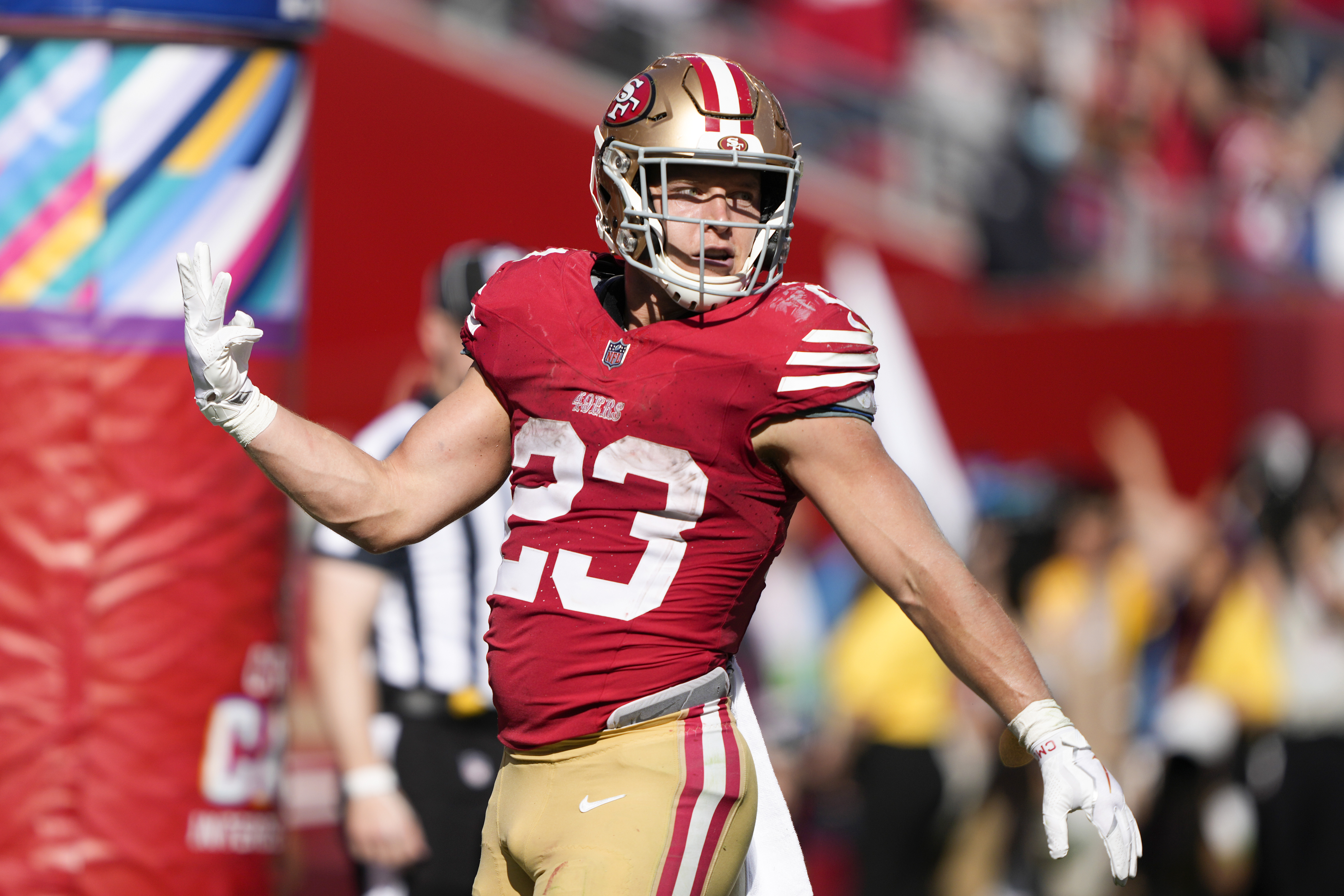 Running back Christian McCaffrey of the San Francisco 49ers reacts after scoring his fourth touchdown in the game against the Arizona Cardinals at Levi's Stadium in San Francisco, California, October 1, 2023. /CFP