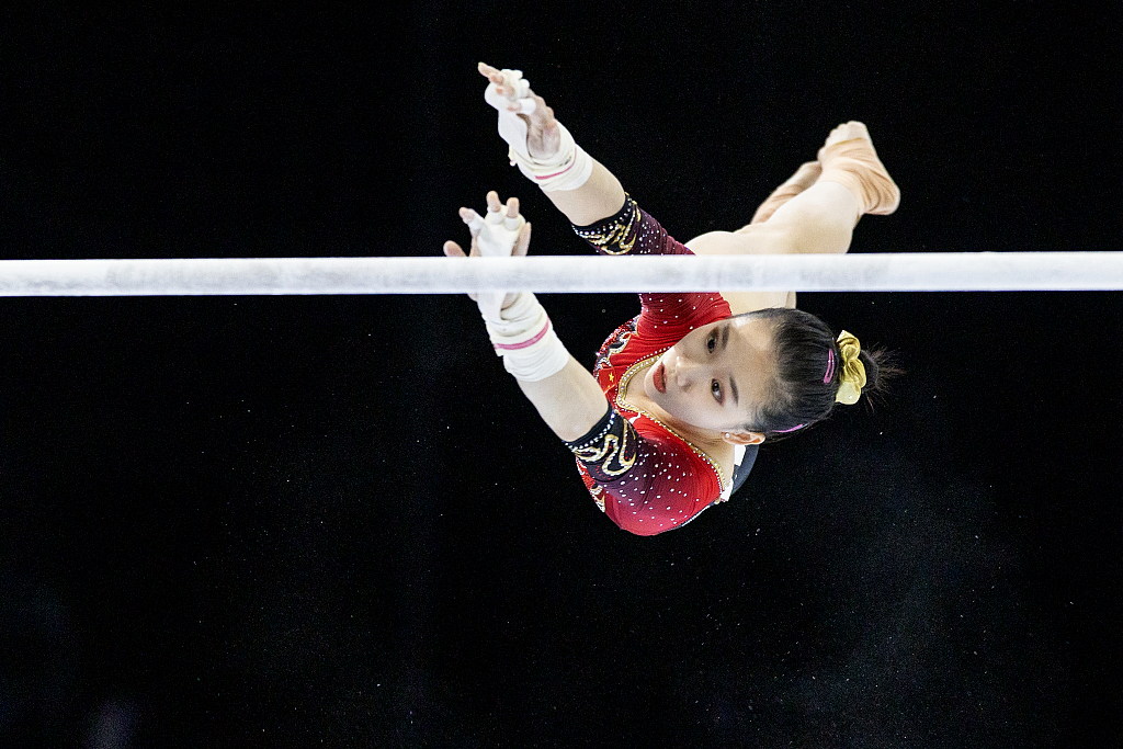 Ou Yushan of China performs her routine on the uneven bars during the Artistic Gymnastics World Championships in Antwerp, Belgium, October 2, 2023. /CFP