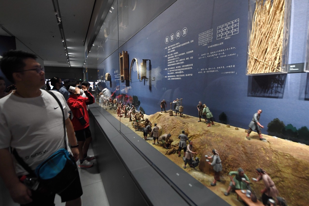 A visitor views a display at the Nanjing City Wall Museum on October 2, 2023 in Nanjing, Jiangsu. /IC