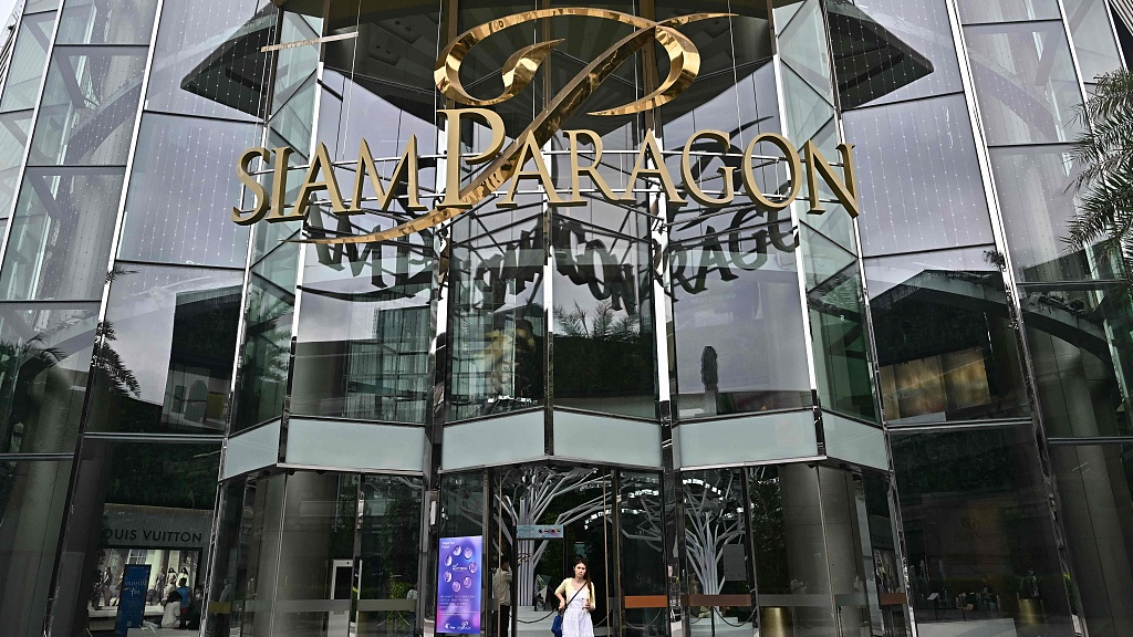 Thailand shooting: teenage suspect arrested after two killed at luxury mall