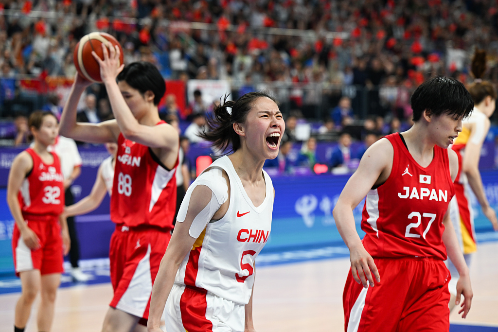 Wang Siyu (#5) of China reacts after making a shot in the basketball women's final against Japan at the 19th Asian Games in Hangzhou, east China's Zhejiang Province, October 5, 2023. /CFP