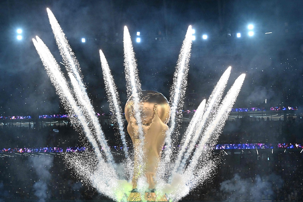Fireworks go off around a giant replica of the World Cup trophy at Education City Stadium in Al-Rayyan, Doha, Qatar, December 9, 2022. /CFP