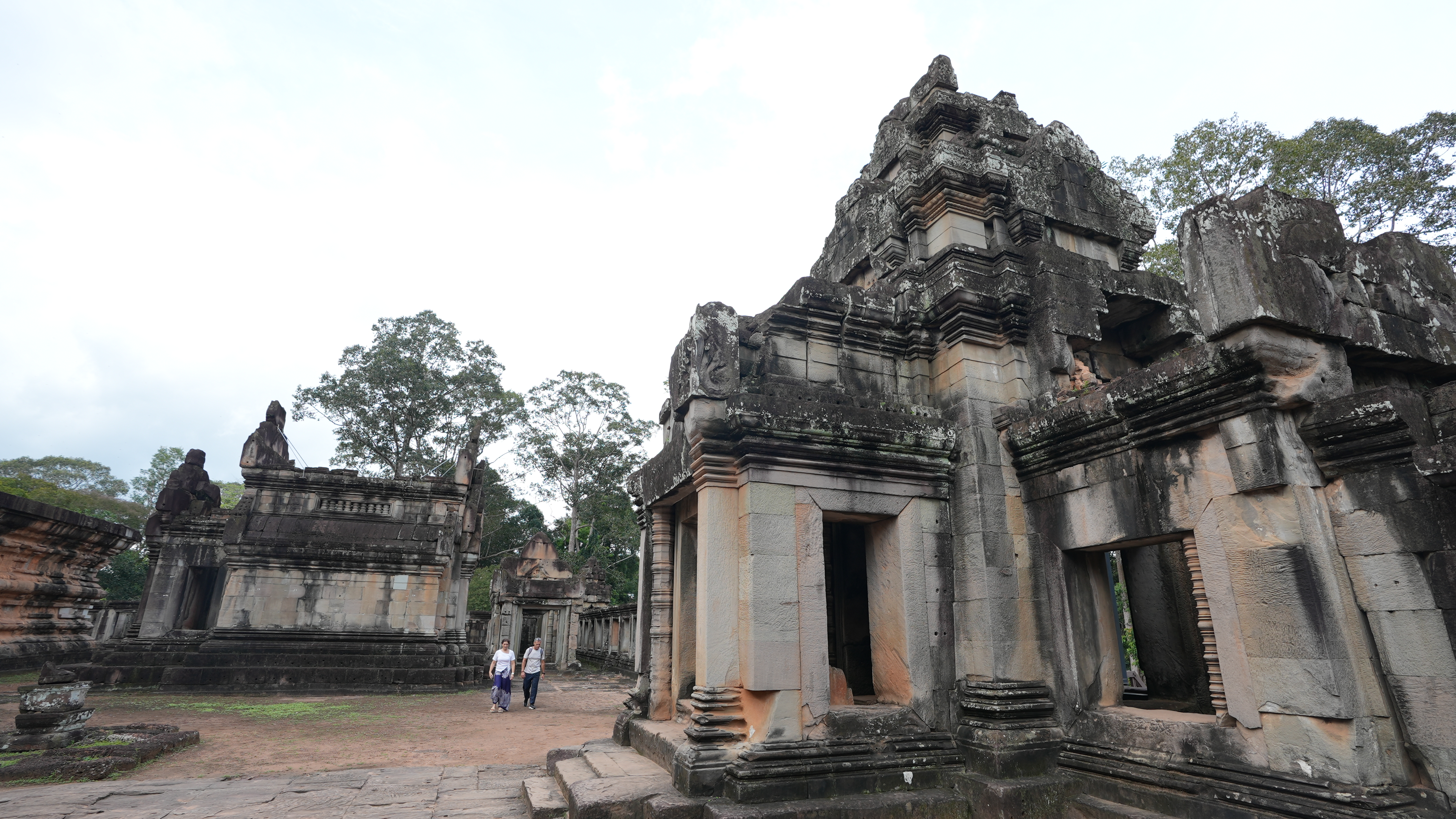 Visitors appreciate the Ta Keo pyramid at the Angkor Archaeological Park, Cambodia. /CGTN