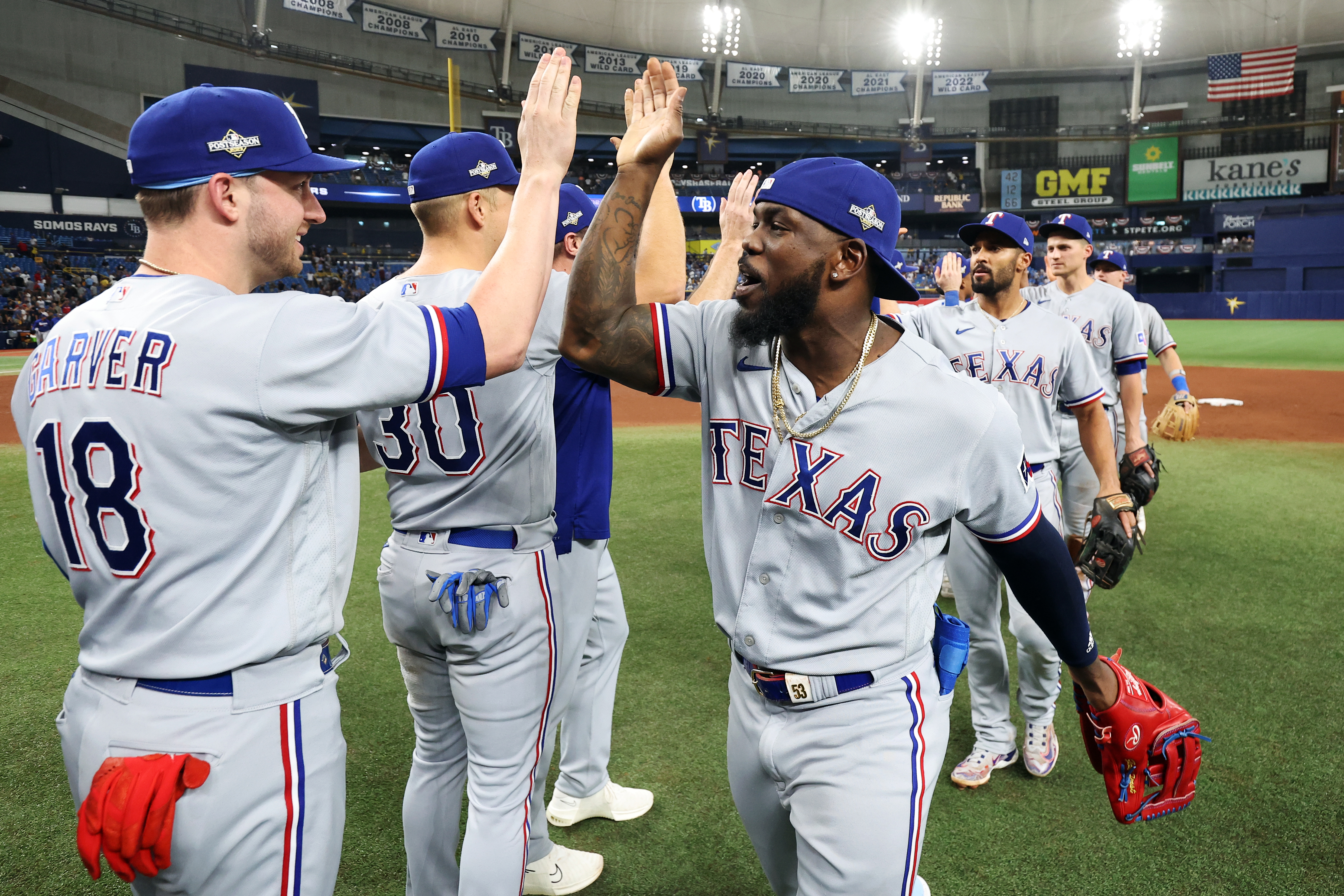 Players of the Taxes Rangers celebrate their 7-1 win over the Tampa Bay Rays in game 2 of the American League Wild Card Series at Tropicana Field in St. Petersburg, Florida, October 4, 2023. /CFP